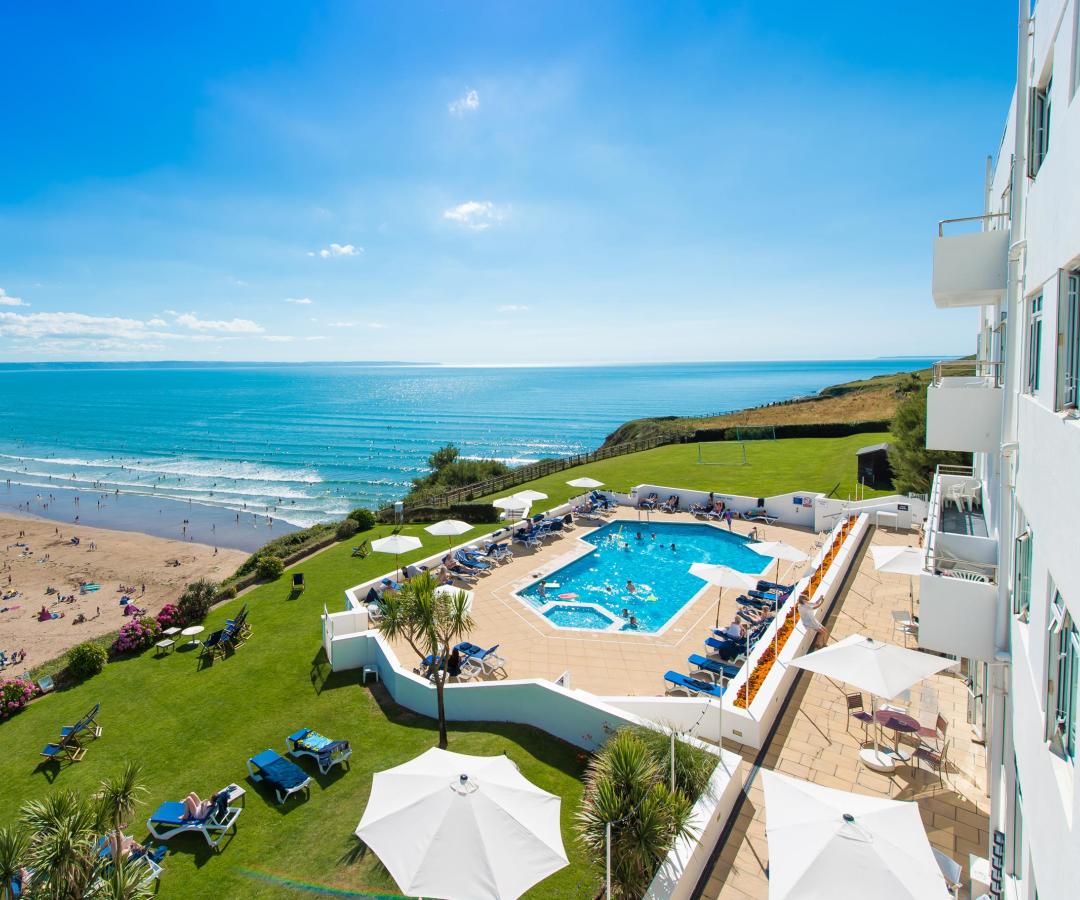 Exterior of The Saunton Sands Hotel North Devon showing beach and swimming pools