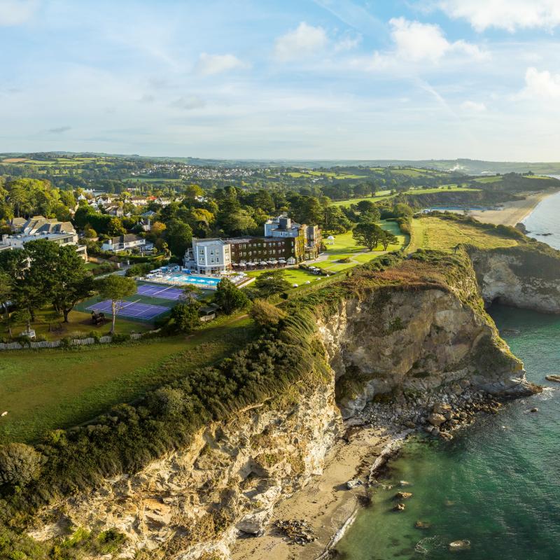 Coastal shot of The Carlyon Bay Hotel in Cornwall showing the coastline along the hotel